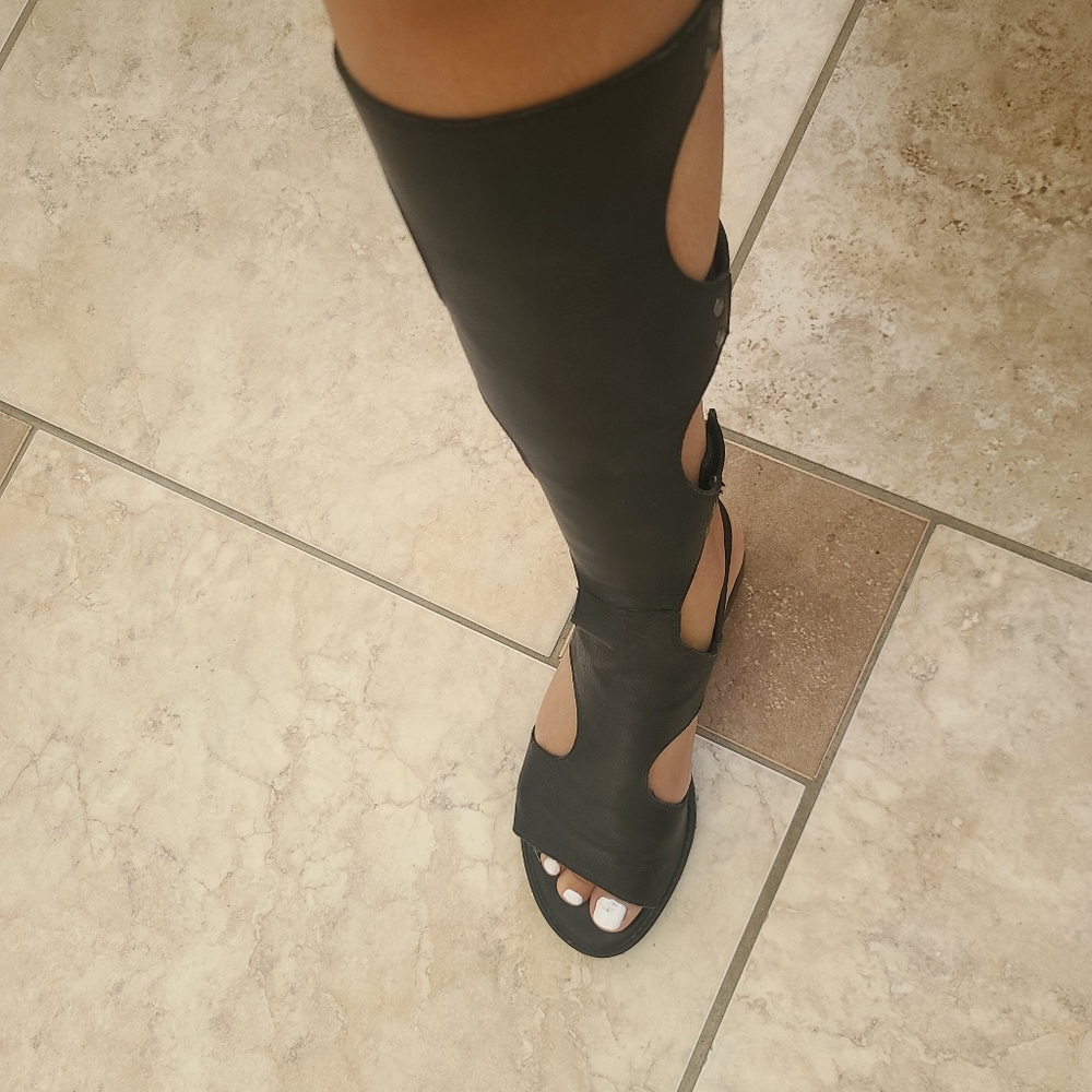 Gladiator black leather sandals.